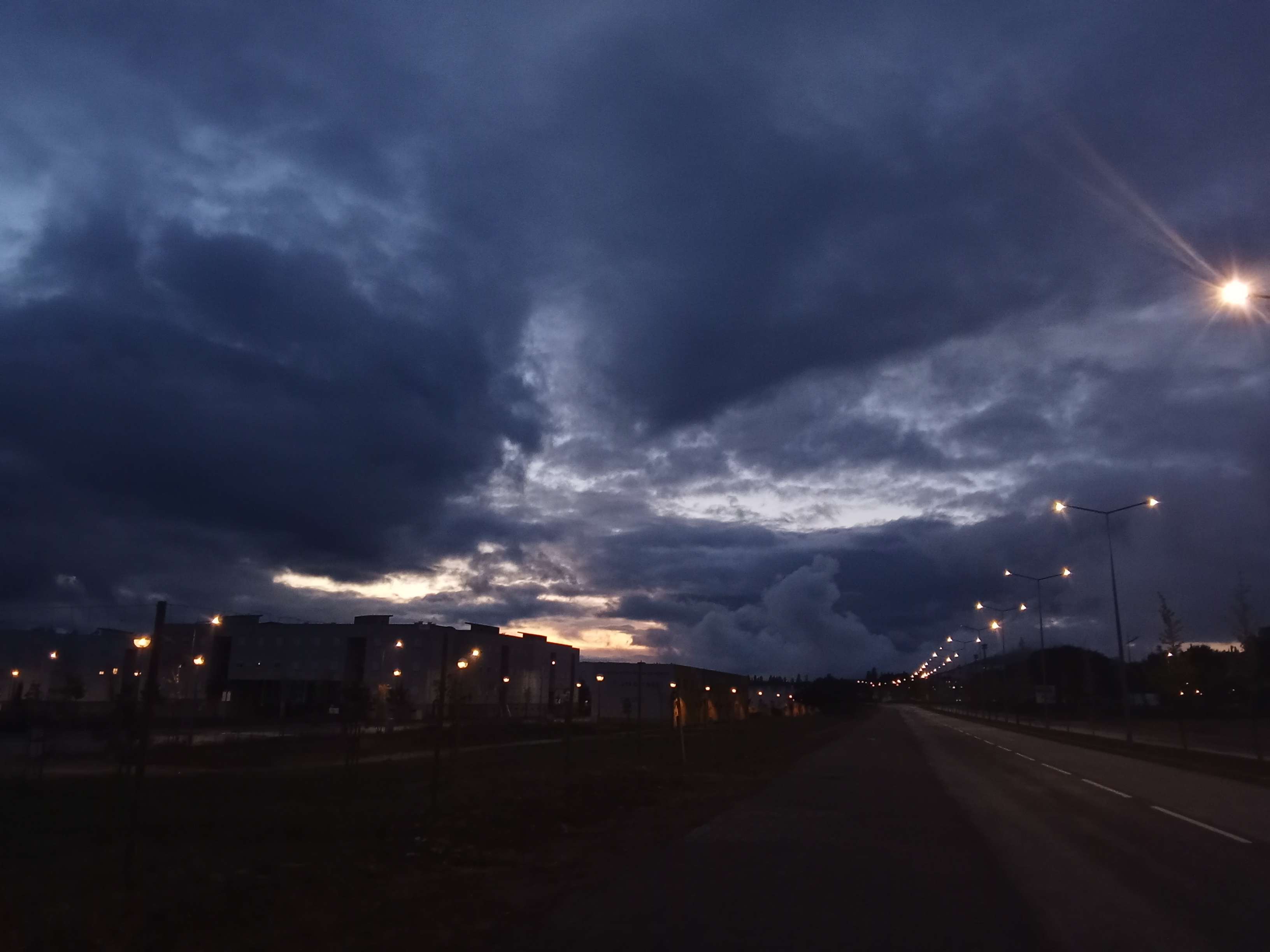 the aesthetic of city lights on a dark n gloomy night is amazing, and although this isn't that since its bum fuck nowhere and not a city, i feel its close enough